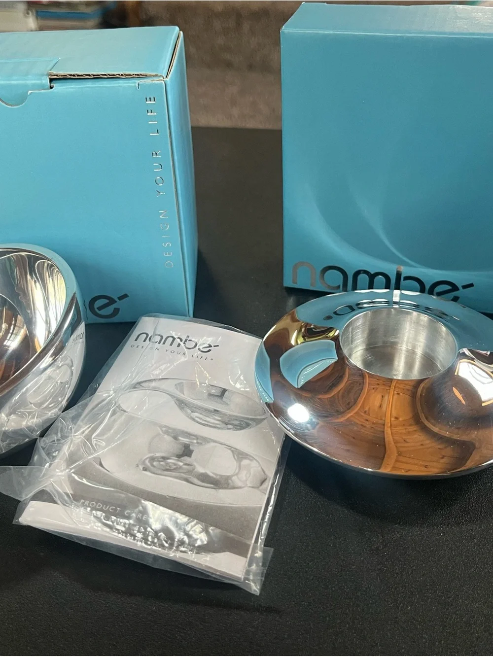 Set of 2 NAMBE’ items. Bowl and candleholder. Silver tone. Pre-owned